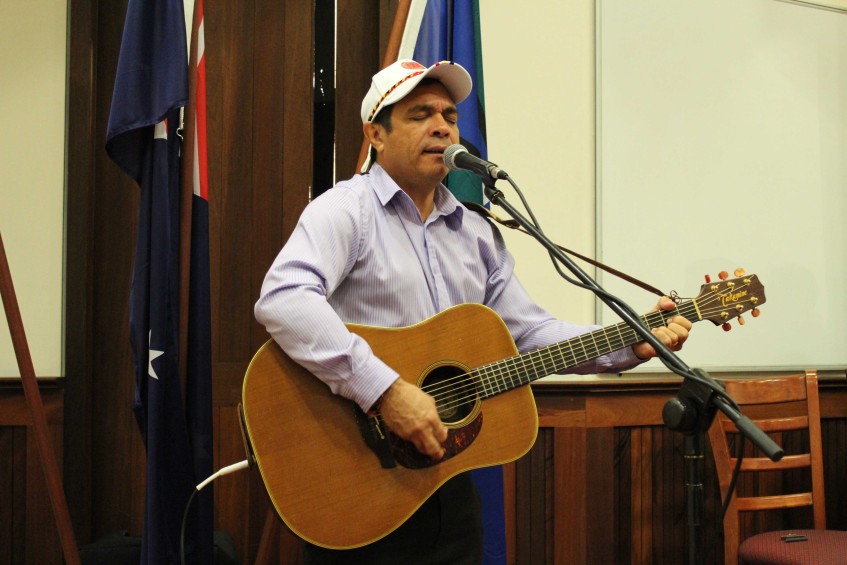 Aboriginal Artist David Pigram, from renowned Broome seven-piece country folk/rock band The Pigram Brothers, sings for the audience at a special event held for NAIDOC Week at UNDA, Fremantle.